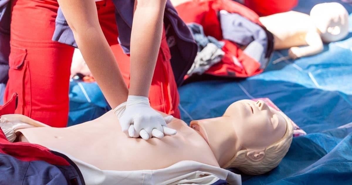 A caregiver preparing essential first-aid supplies.